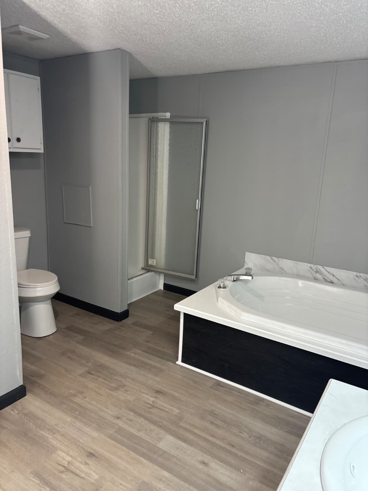 1997 completely re-done 28x64,  doublewide in rented private land  (pre-owned)  home features