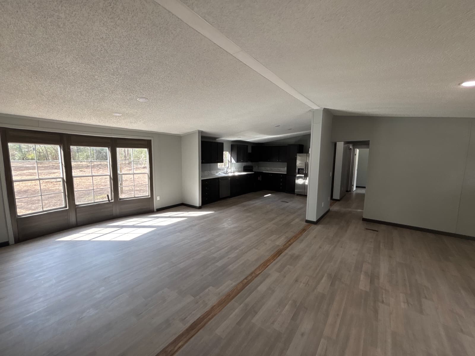 1997 completely re-done 28x64,  doublewide in rented private land  (pre-owned)  home features