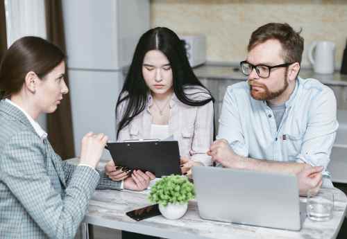 Couple meeting manager